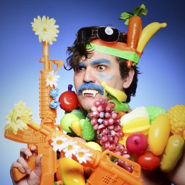 All I Wanna Do is [FX: GUNSHOTS] with a [FX: GUN RELOADING] and a [FX: CASH REGISTER] and Perform Some Comedy!