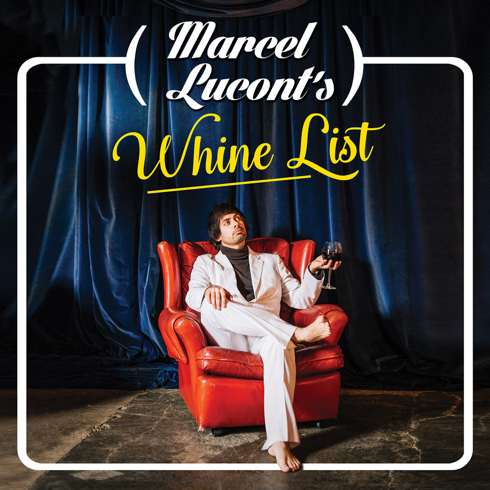 Promo poster for Marcel Lucont's Whine List with Marcel sat in an armchair in a white suit and a glass of red wine in hand