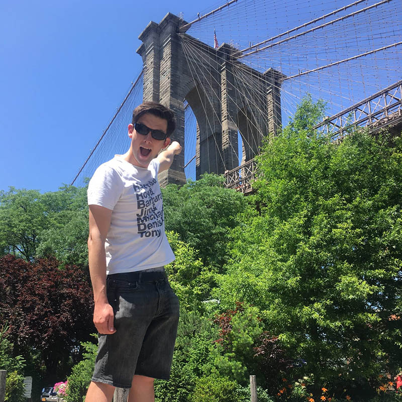 Photo of Kieran Hodgson outside by a bridge in America