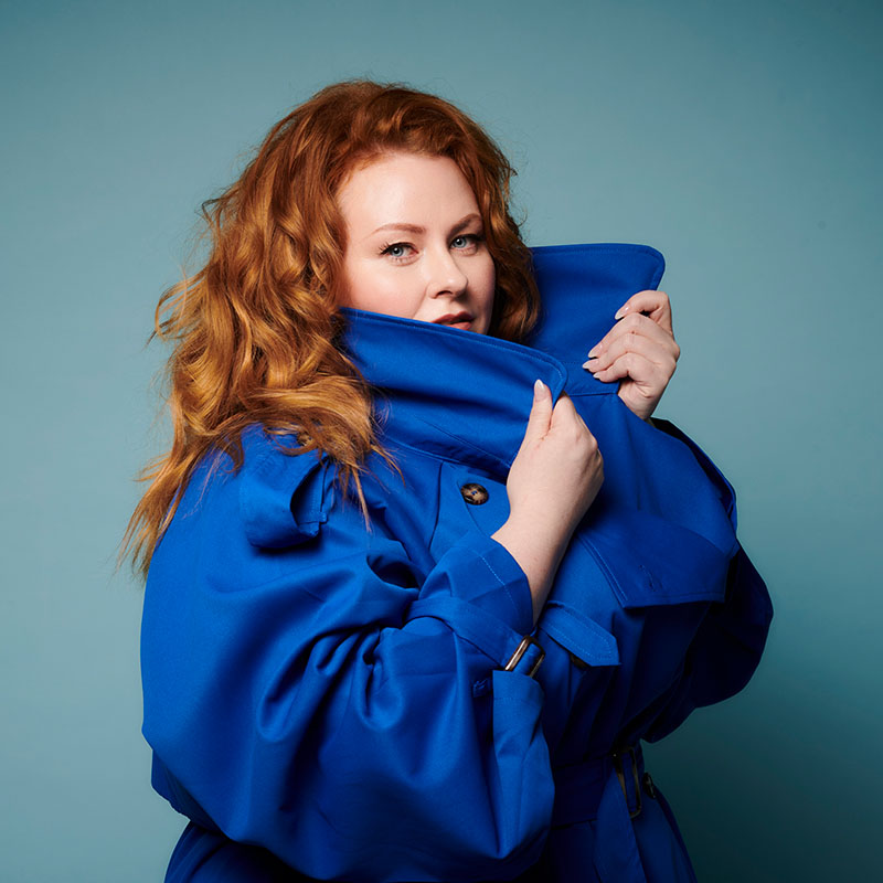 Photo of Amy Gledhill in a big blue coat