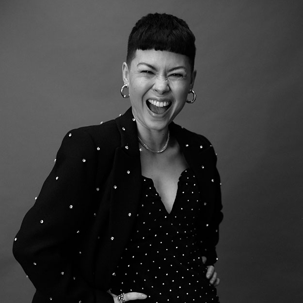 Photo of Anna Leong Brophy laughing