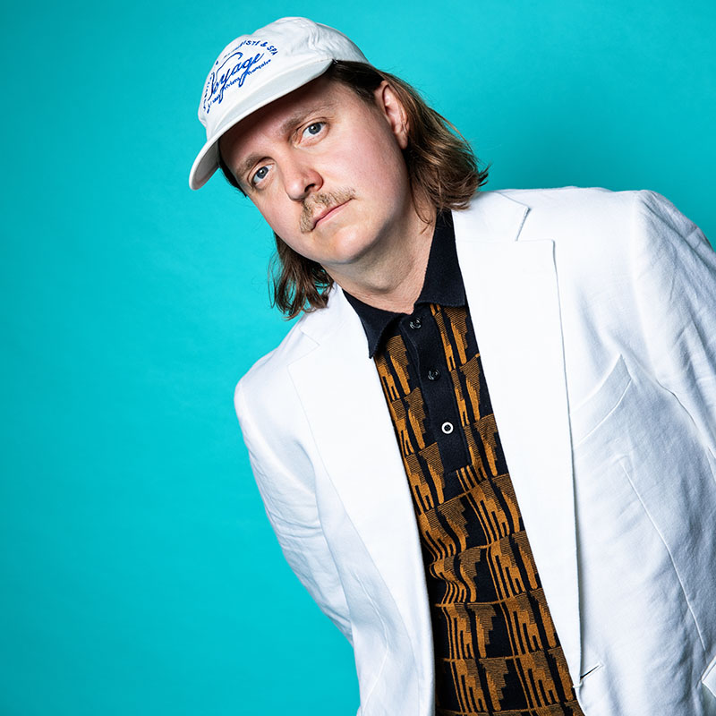 Picture of Joey Page wearing a white jacket and whit cap