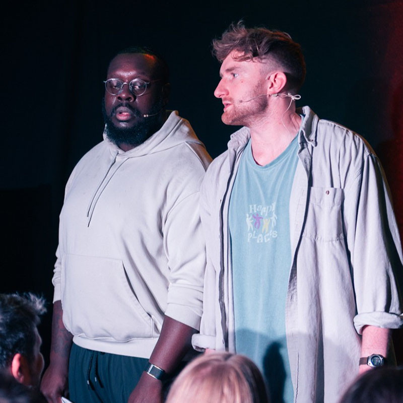 Photo of Carwyn and Ekow stood next to each other on stage