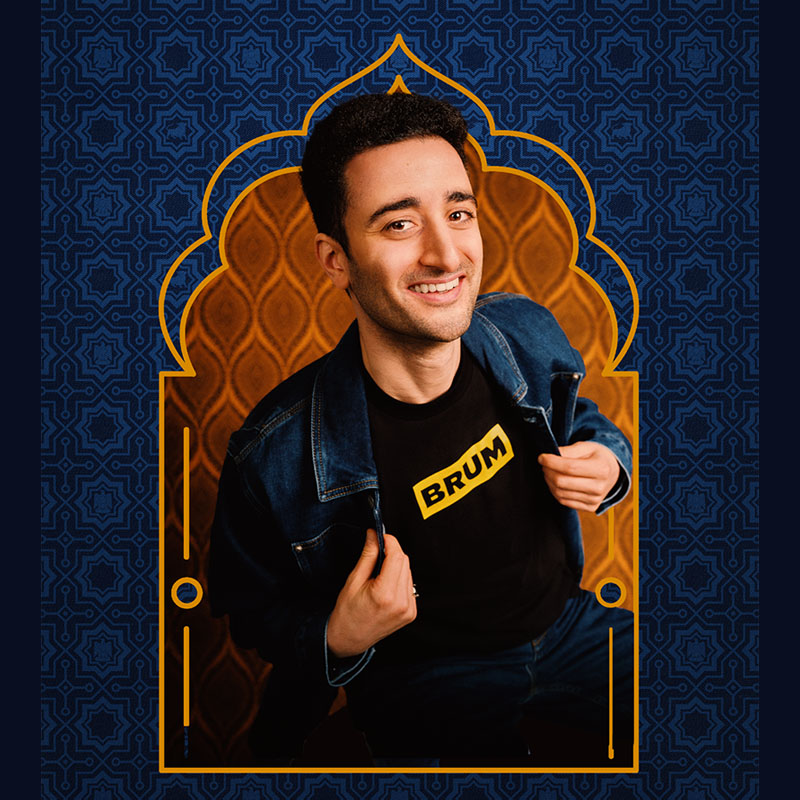 Photo of Hasan Al-Habib showing a tshirt sayin BRUM under his jacket