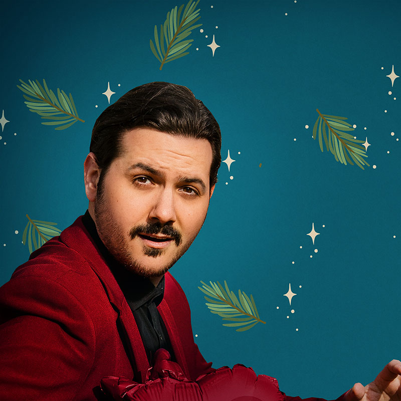 Photo of Ignacio Lopez against a christmas background