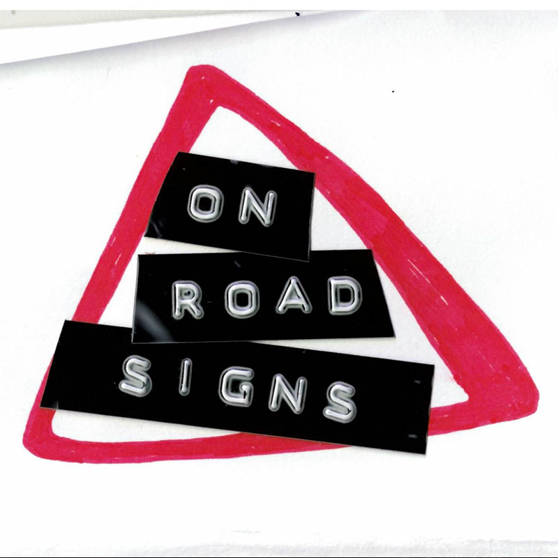 Image of a red warning triangle with ON ROAD SIGNS typed out in the centre